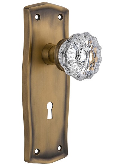 Prairie Design Mortise Lock Set With Fluted Crystal Door Knobs in Antique Brass.